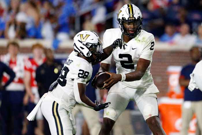 Oct 28, 2023; Oxford, Mississippi, USA; Vanderbilt Commodores quarterback Walter Taylor (2) hands the ball off to running back Sedrick Alexander (28) during the second half against the Mississippi Rebels at Vaught-Hemingway Stadium
